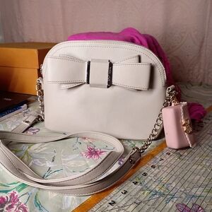 Betsey Johnson Cream Bow Crossbody Bag with Pink Charm